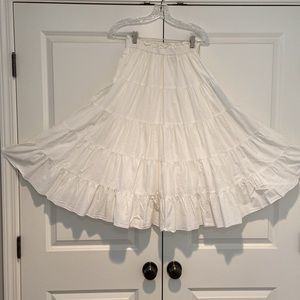 Hundred percent cotton tiered off-white skirt. Full and flouncy. Size small